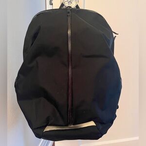Lululemon Center Zip Black Backpack with yoga mat dropdown